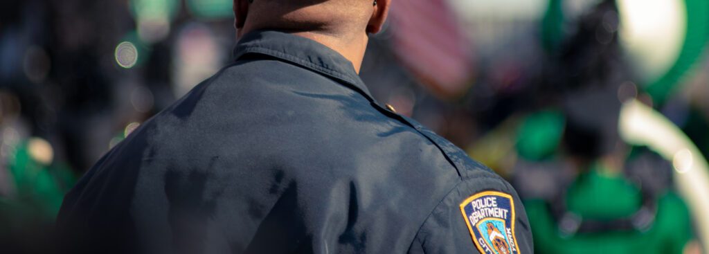 Photo of a police officer standing outside